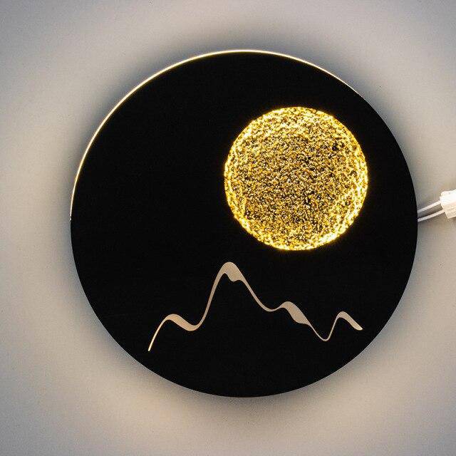 Rund vägglampa i metall med mjuk LED-belysning – måndesign