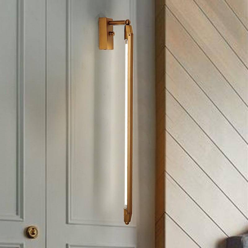 Modern vägglampa i guld med LED-rördesign 68 cm aluminium