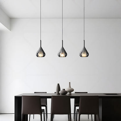 Modern glaspendel i vattendroppsdesign med LED och justerbar höjd