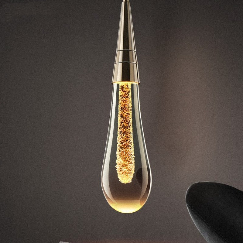 Måninspirerad pendellampa i glas med justerbar höjd och varm LED-belysning