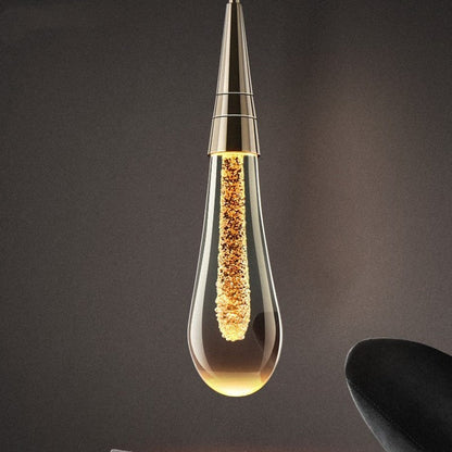 Måninspirerad pendellampa i glas med justerbar höjd och varm LED-belysning