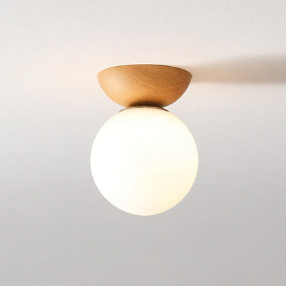 Nordisk LED taklampa i glas med rund opal kupa och träsockel för hall och vardagsrum