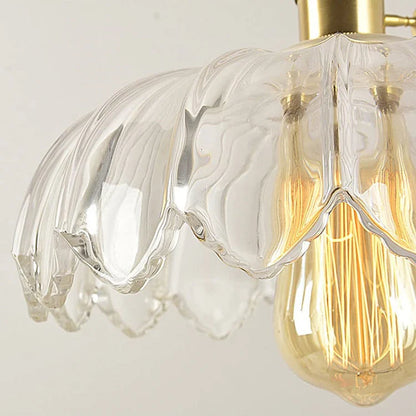 Vintage pendellampa i glas med vågig lampskärm och mässingsdetaljer för matsal och vardagsrum