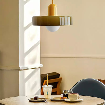 Pendellampa i färgat glas med cylinderform och justerbar höjd