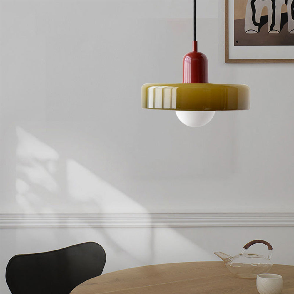 Pendellampa i färgat glas med cylinderform och justerbar höjd