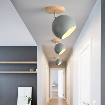 Vägglampa LED i trä och metall med justerbar bollformad design