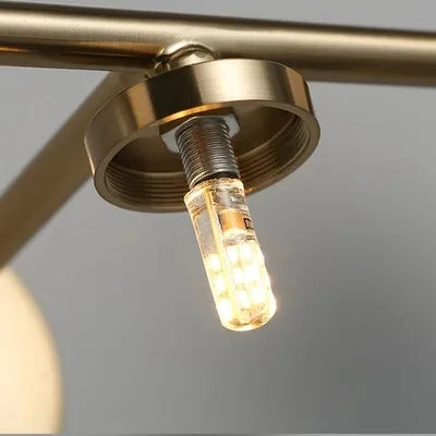 Vägglampa i modern vintage-stil med justerbar arm – i elegant guld