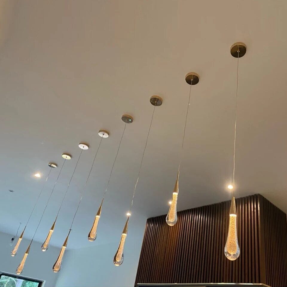 Måninspirerad pendellampa i glas med justerbar höjd och varm LED-belysning