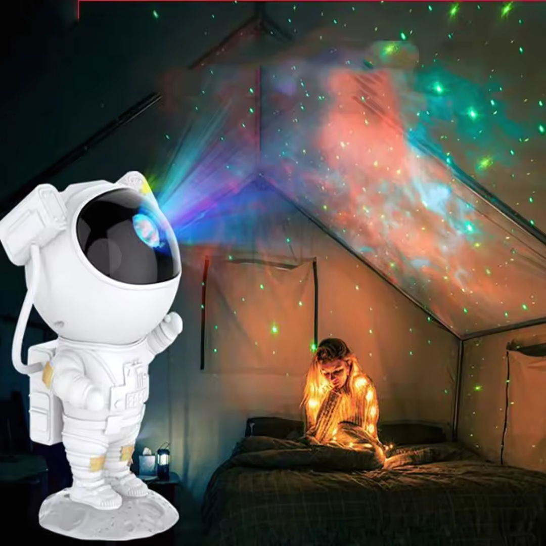 Cosmotéa | LED-projektorlampa i astronautdesign med dekorativ stjärneffekt