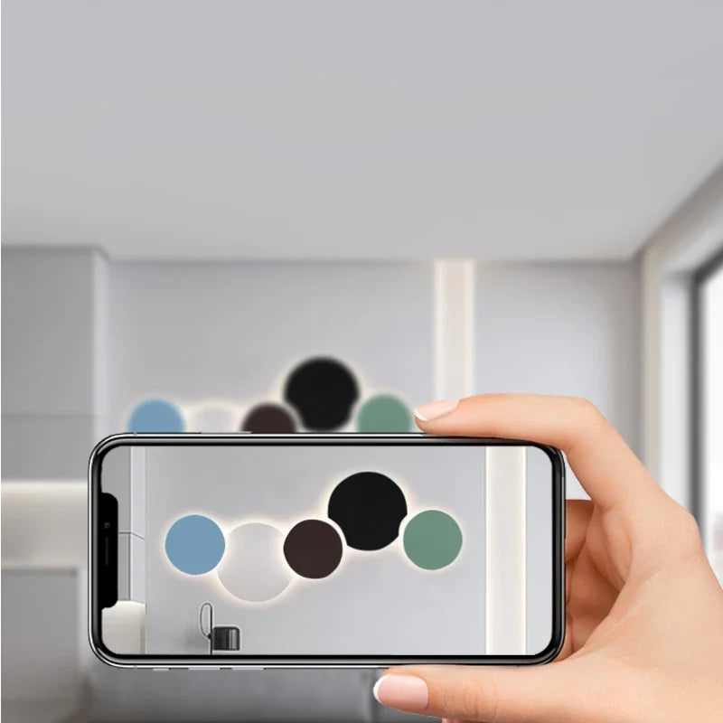 Minimalistisk LED-vägglampa i metall med cirkulär design