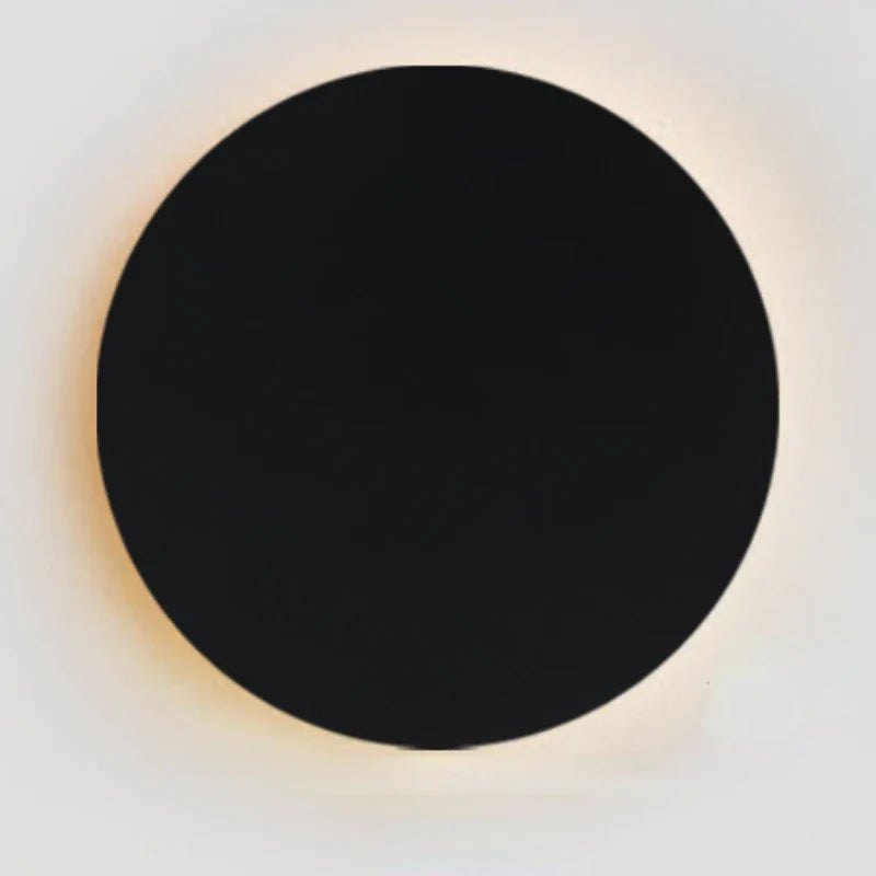 Minimalistisk LED-vägglampa i metall med cirkulär design