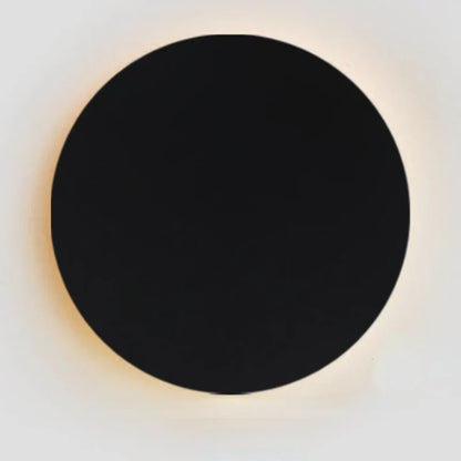 Minimalistisk LED-vägglampa i metall med cirkulär design