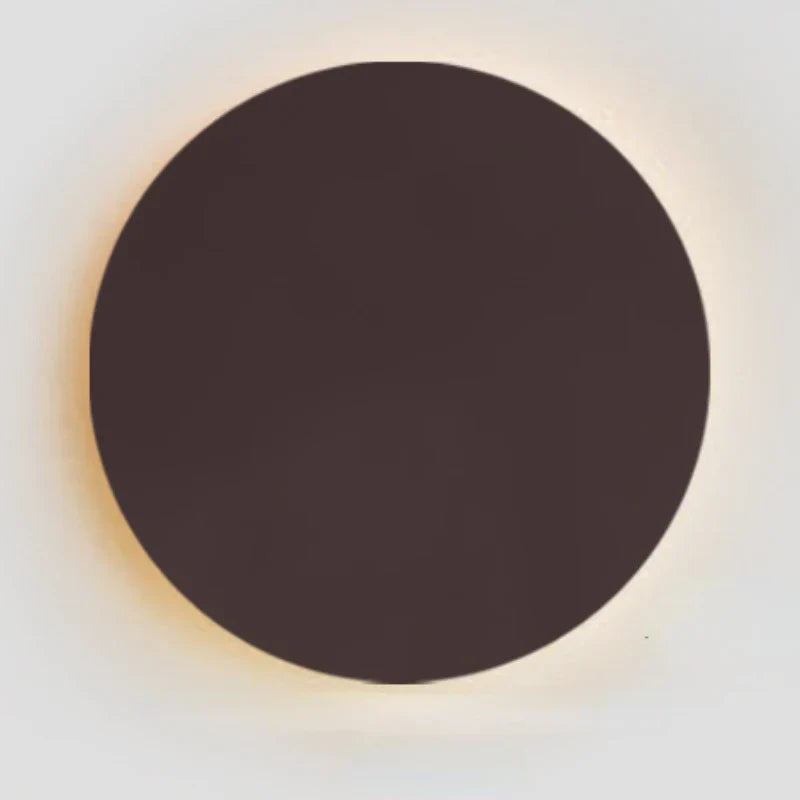 Minimalistisk LED-vägglampa i metall med cirkulär design