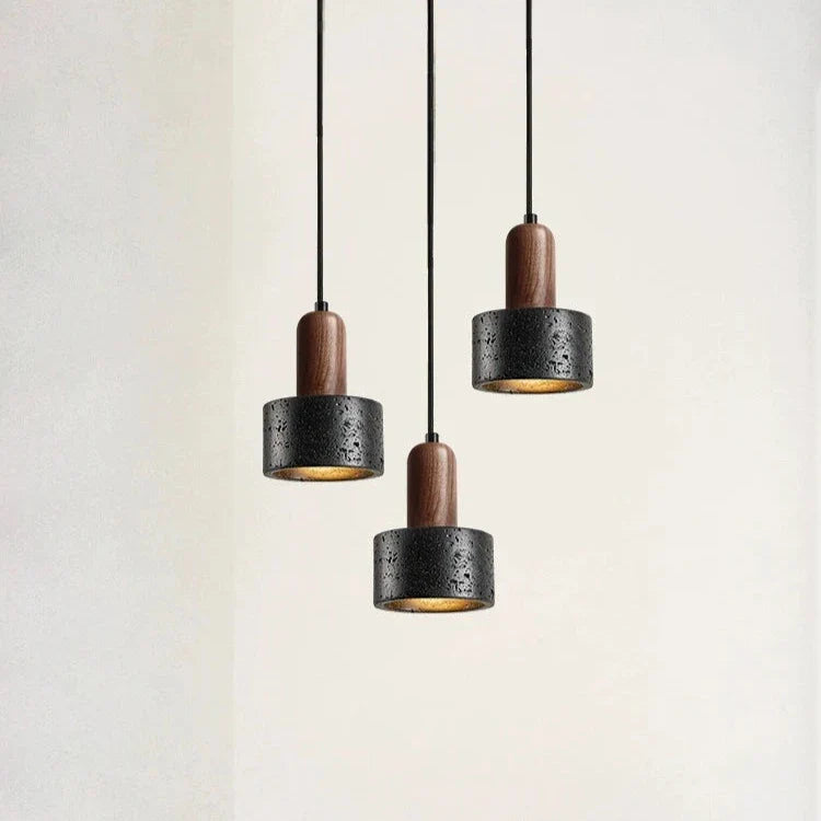 Minimalistisk nordisk stenhänglampa i lava-look med trädetalj