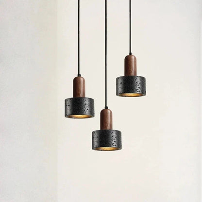 Minimalistisk nordisk stenhänglampa i lava-look med trädetalj