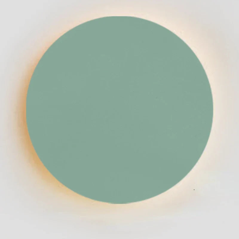 Minimalistisk LED-vägglampa i metall med cirkulär design