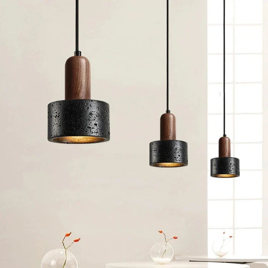 Minimalistisk nordisk stenhänglampa i lava-look med trädetalj