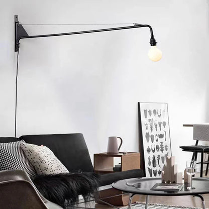 Minimalistisk vägglampa med lång arm och roterbar design
