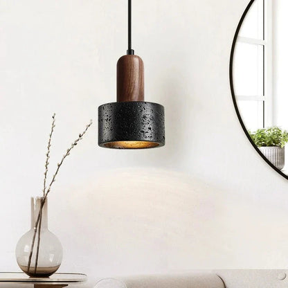 Minimalistisk nordisk stenhänglampa i lava-look med trädetalj