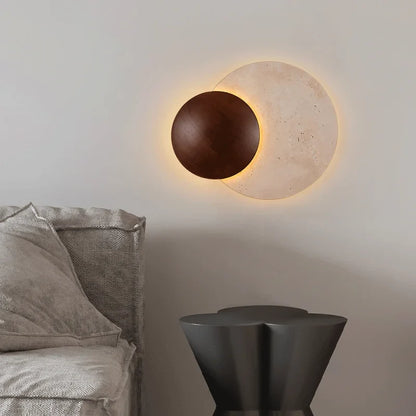 Rund vägglampa i naturlig sten med vintage Art Déco-design