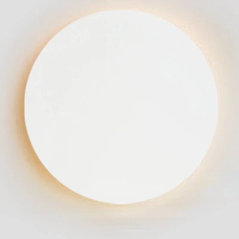 Minimalistisk LED-vägglampa i metall med cirkulär design