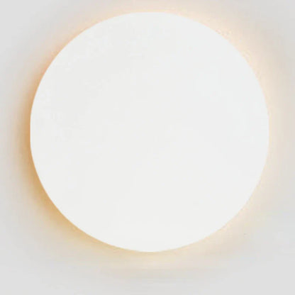Minimalistisk LED-vägglampa i metall med cirkulär design