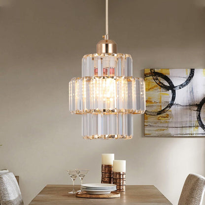 Elegant kristallpendel i svart eller guld med justerbar höjd och varm LED