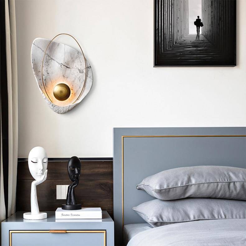 Modern konstnärlig vägglampa i skalformad design