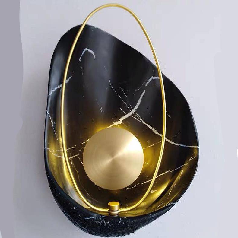 Modern konstnärlig vägglampa i skalformad design