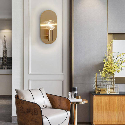 Elegant vägglampa i metall med rund design