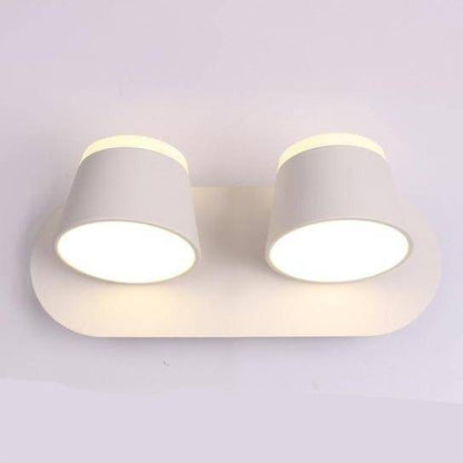 Modern vägglampa i metall med dimbar LED-funktion