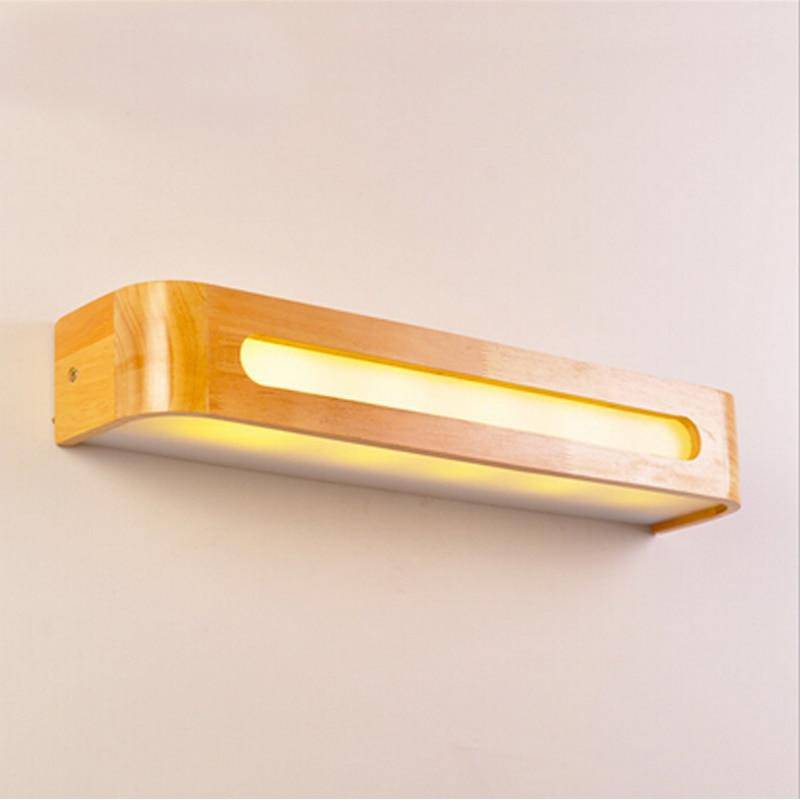 Modern vägglampa i trä och glas med integrerad LED-belysning