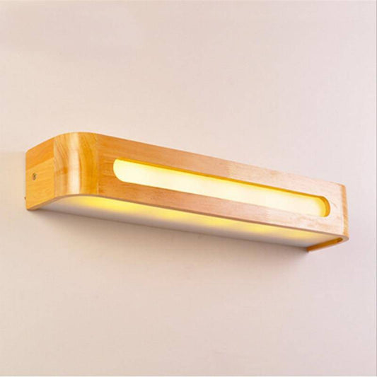 Modern vägglampa i trä och glas med integrerad LED-belysning