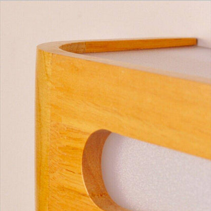 Modern vägglampa i trä och glas med integrerad LED-belysning