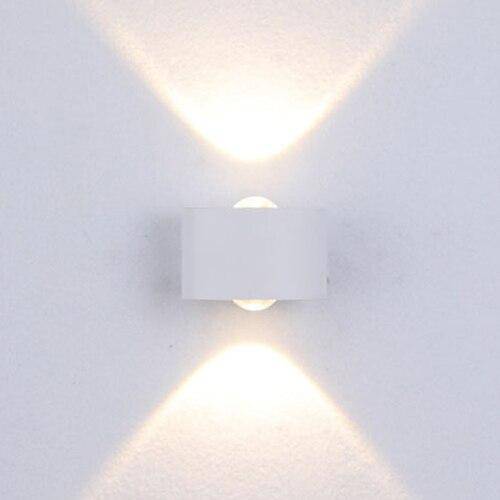 Vägglampa LED i metall för inom- och utomhusbruk med geometriskt ljus