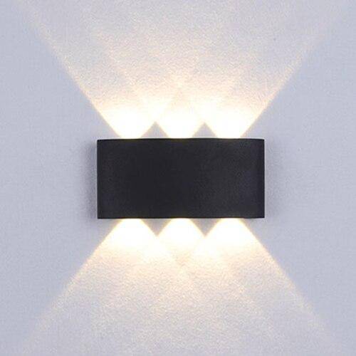 Vägglampa LED i metall för inom- och utomhusbruk med geometriskt ljus