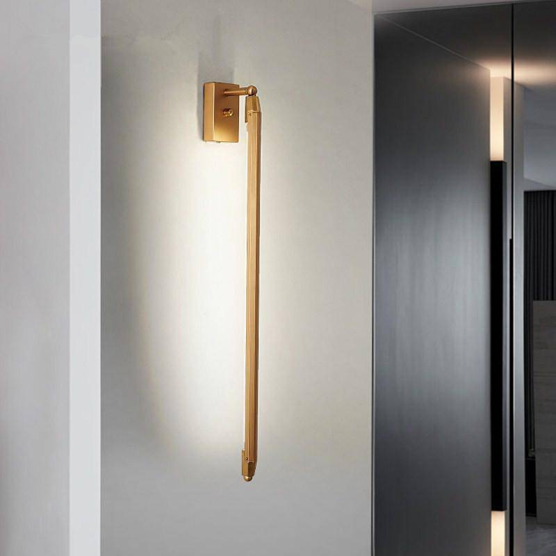 Modern vägglampa i guld med LED-rördesign 68 cm aluminium
