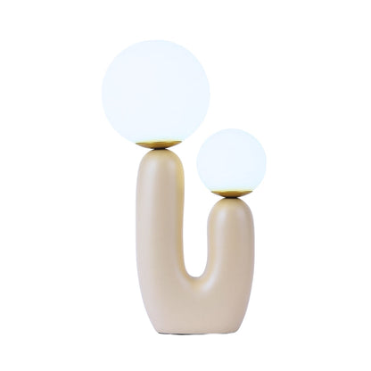 Konstnärlig bordslampa med resinbas och frostat glas – modern skulptur för sovrum och vardagsrum